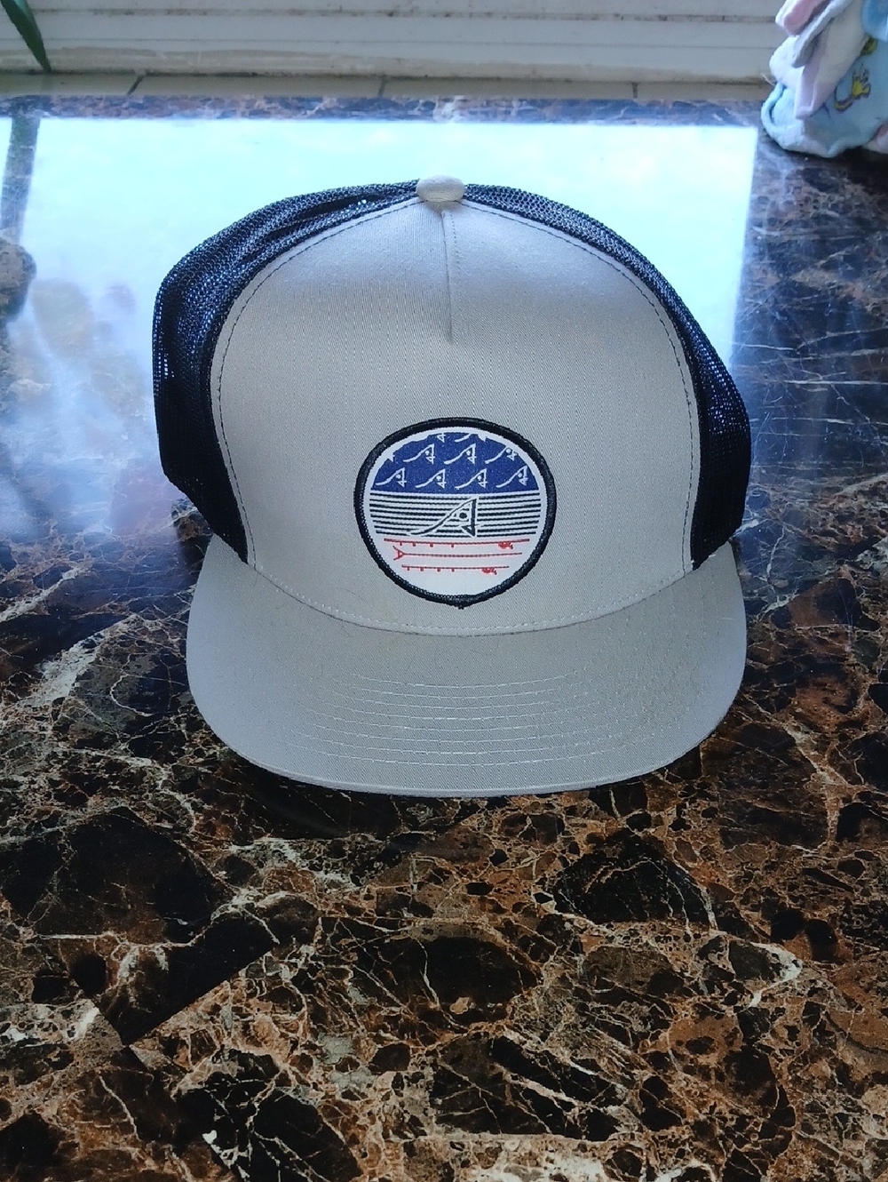Gray and Black Trucker Hat with Nautical Patch